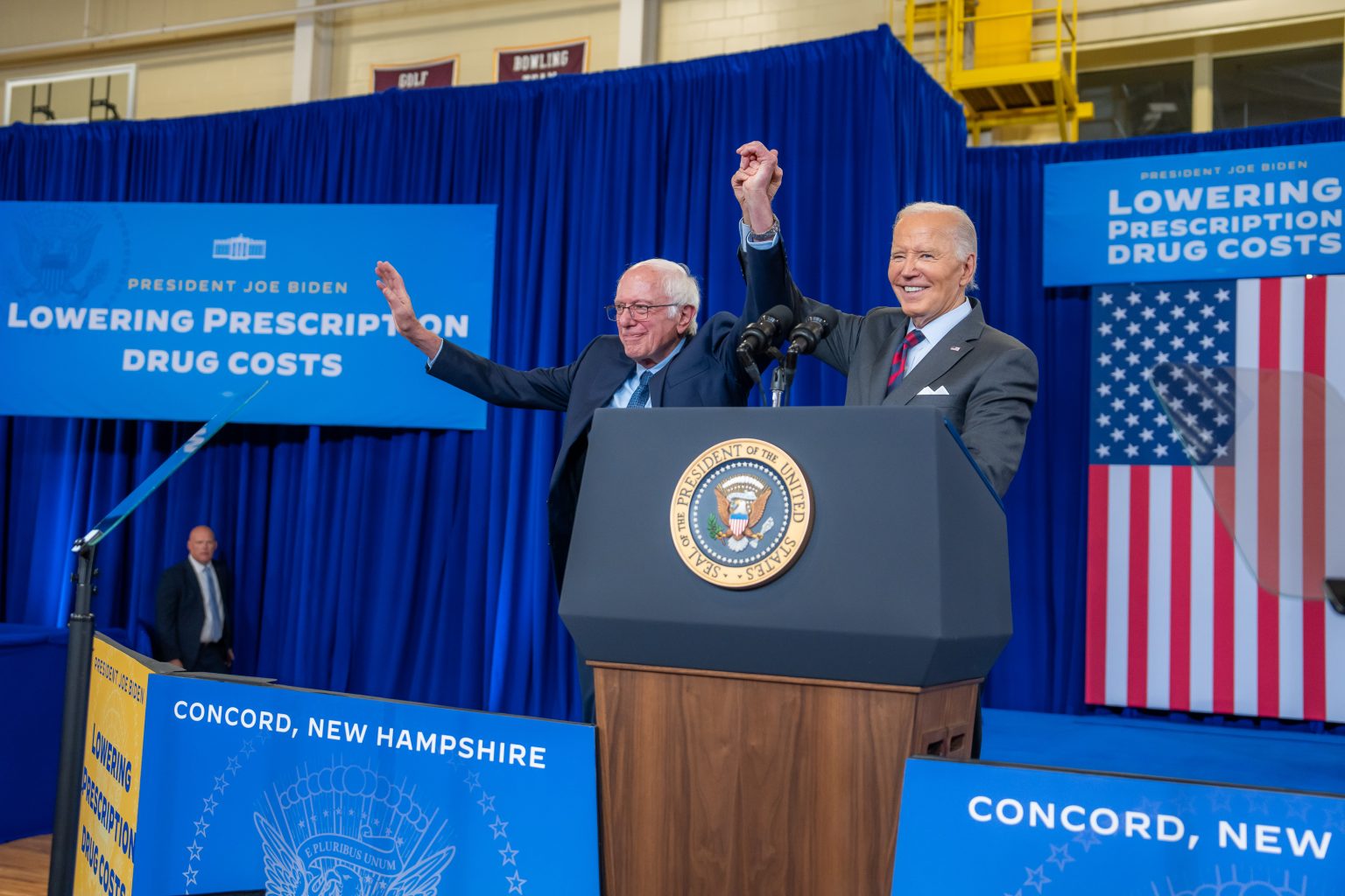 President Joe Biden and Senator Bernie Sanders (I-VT) wave to the crowd after the President’s remarks on lowering prescription drug costs, Tuesday, October 22, 2024, at NHTI Community College in Concord, New Hampshire. (Official White House Photo by Adam Schultz)